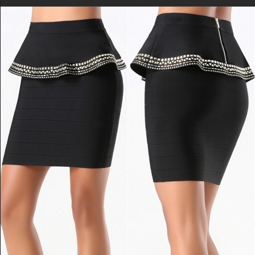 Gorgeous Bebe black peplum studded skirt